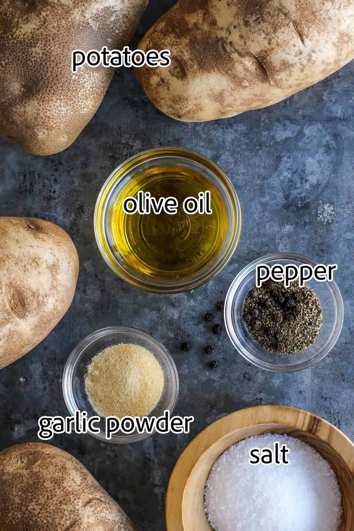 This baked potato recipe makes fluffy, tender potatoes with salty, crispy skin! Learn how to bake potatoes in the oven, plus 3 more ways! ingredients needed for baked potatoes