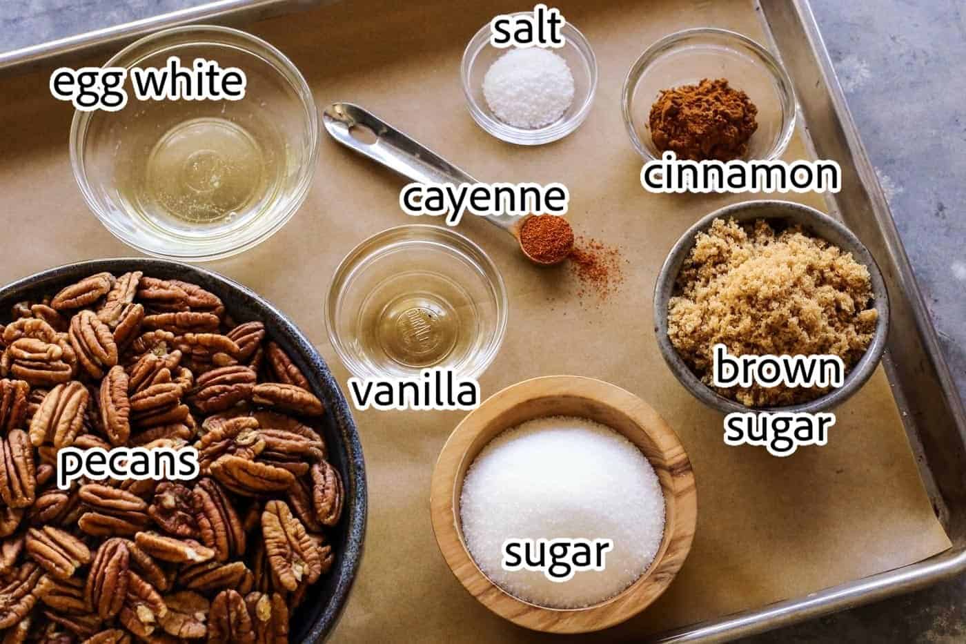 Crunchy candied pecans recipe for a sweet and salty treat with just a hint of heat. The perfect snack, salad topper, or edible gift! ingredients needed for candied pecans