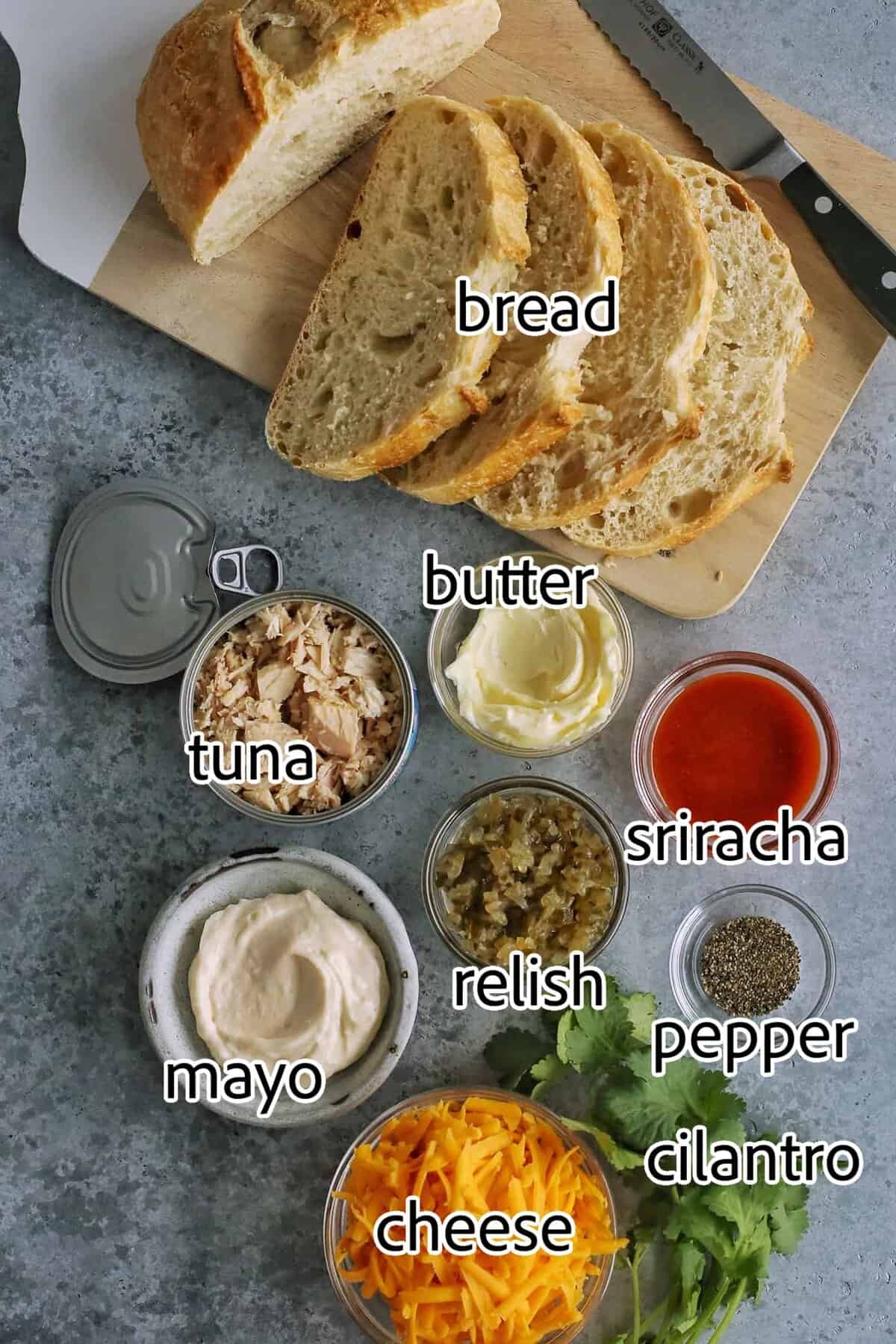 This spicy tuna melt recipe is a quick, easy hot sandwich with tuna, melty cheese, and spicy sriracha made warm and toasty in the oven! ingredients needed for tuna melts