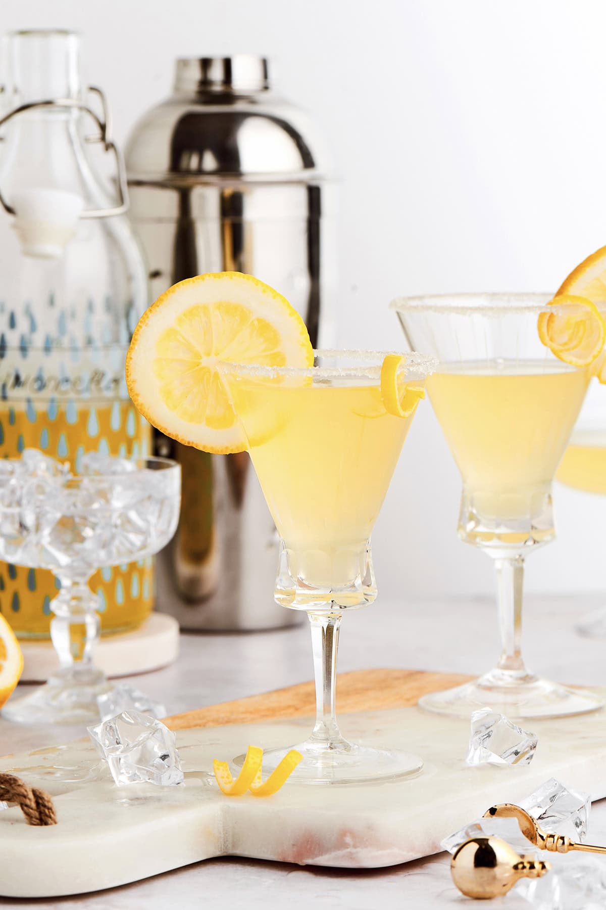 This limoncello martini is the brightest, sunniest cocktail you’ll ever sip! It’s tart yet smooth, with just the right balance of sweetness. two glasses of Limoncello Martini cocktails