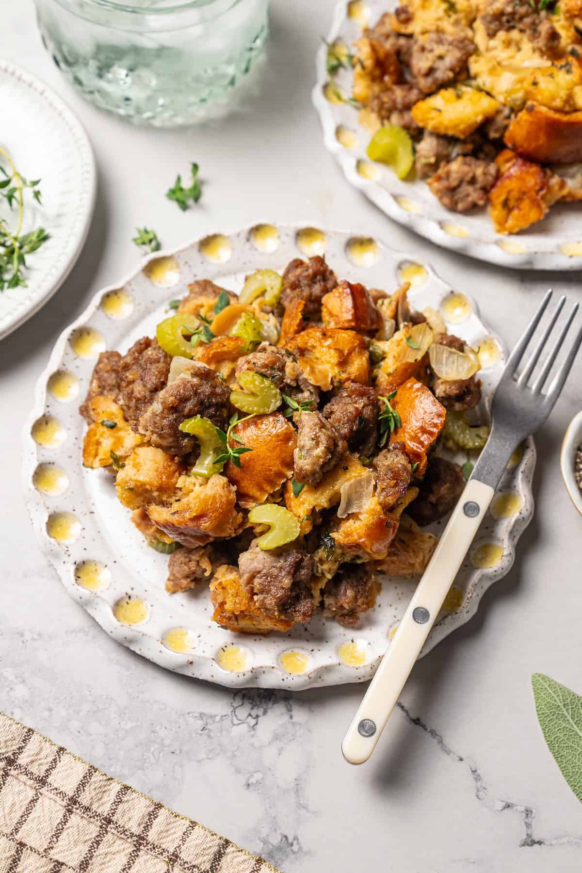 sausage stuffing on a plate with a fork