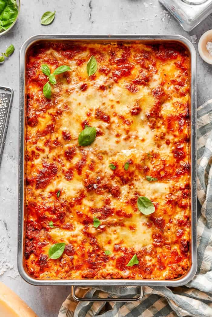 Lazy ravioli lasagna in metal baking pan.