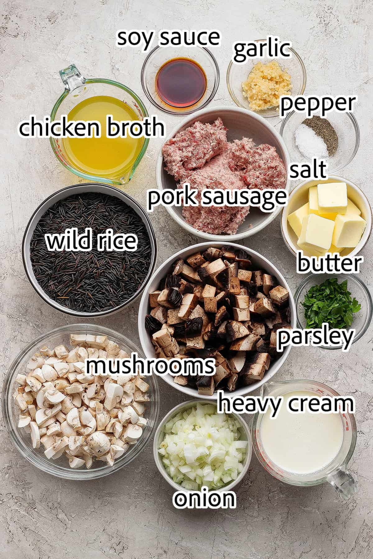 This creamy Wild Rice Casserole with sausage and mushrooms is deeply savory, hearty, and perfect for cozy dinners and holiday celebrations! ingredients needed for wild rice casserole