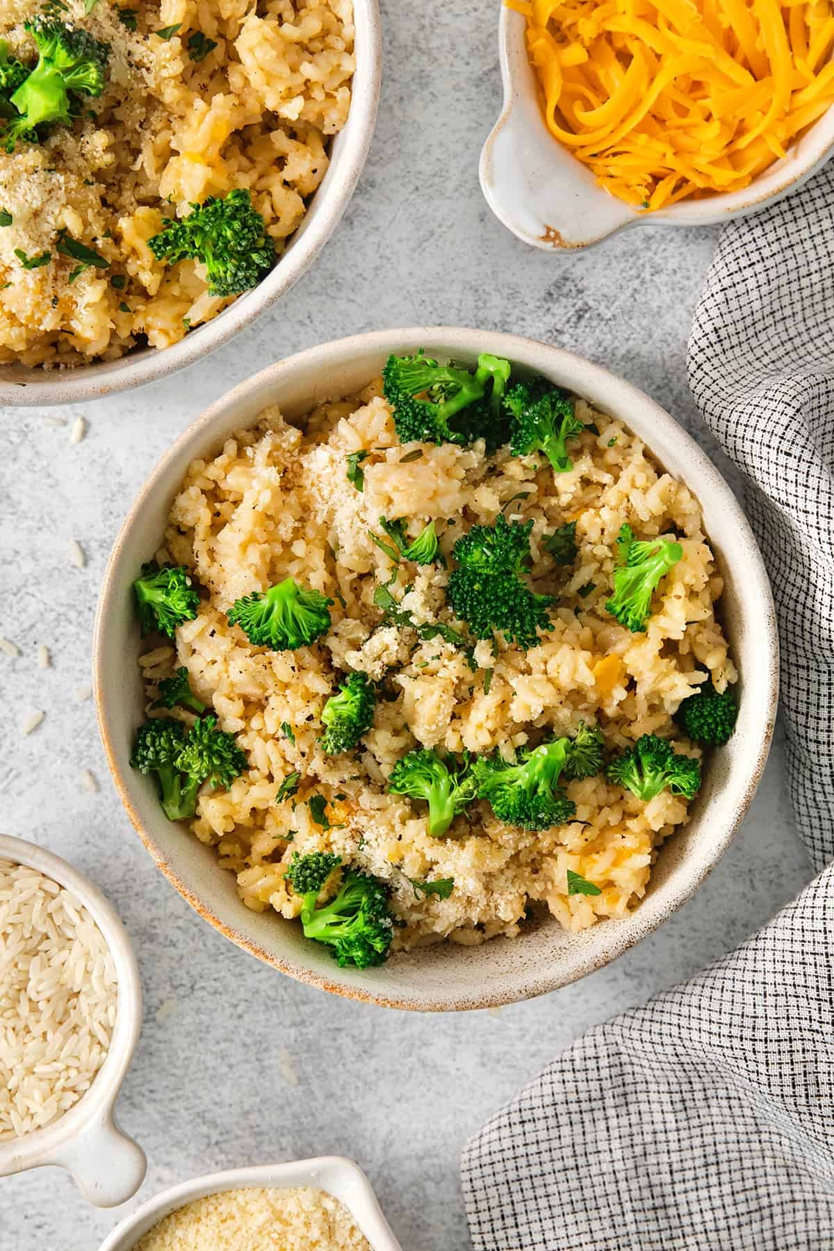 Bowl of cheesy rice and broccoli.