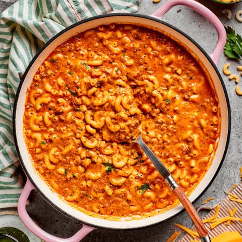 overhead photo of a pink pot of cheesy hamburger helper