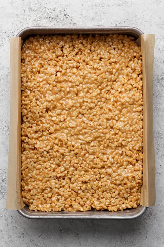 Rice cereal layer for scotcheroos in pan.
