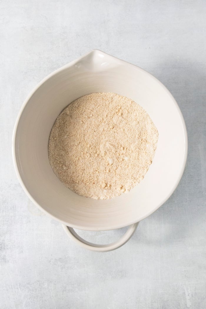 Financiers are an elegant treat that feels straight from a French bakery! My version is made in a muffin pan, so it's easy for home bakers. Dry ingredients for financiers in bowl.