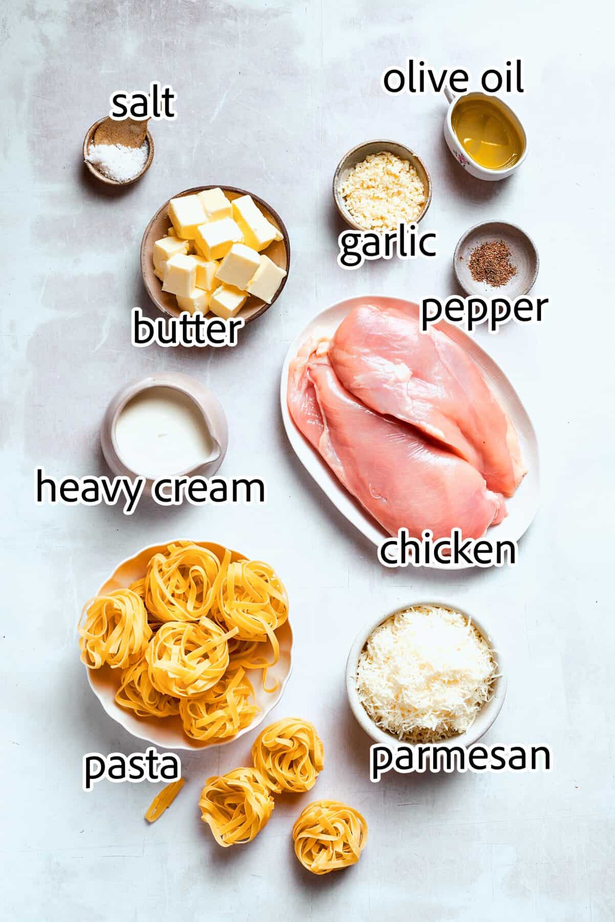 This chicken fettuccine Alfredo pairs chewy pasta with a garlicky Parmesan cream sauce and pan-fried chicken for a restaurant-worthy meal. ingredients needed for chicken fettuccine Alfredo