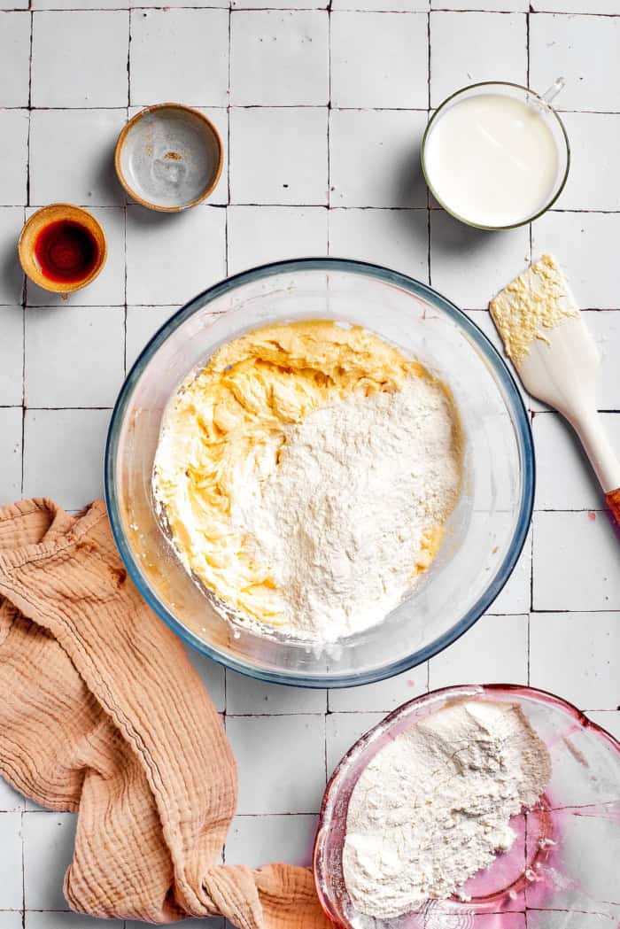 Mixing dry ingredients into cake batter.