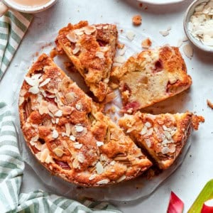 Overhead photo of a Norwegian Rhubarb Cake, sliced