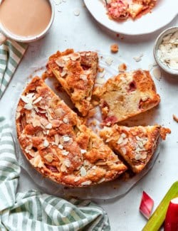 Overhead photo of a Norwegian Rhubarb Cake, sliced